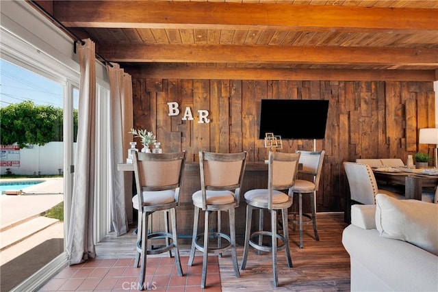 254 Piedmont Ave, Claremont, CA 91711 - bar with wood ceiling with exposed beams, wooden walls, and tile patterned floors