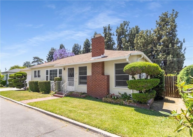 7933 Rhea Vista Dr, Whittier, CA 90602 - ranch-style house featuring a chimney and stucco siding