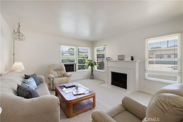 7933 Rhea Vista Dr, Whittier, CA 90602 - living room featuring light carpet, healthy amount of natural light, a fireplace, and baseboards