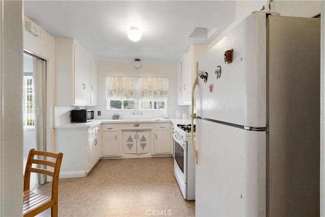 7933 Rhea Vista Dr, Whittier, CA 90602 - kitchen featuring white appliances, light countertops, light floors, and white cabinets