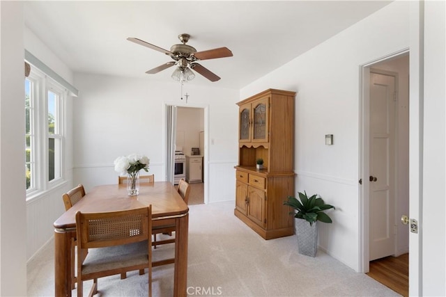7933 Rhea Vista Dr, Whittier, CA 90602 - dining space featuring a ceiling fan and light colored carpet