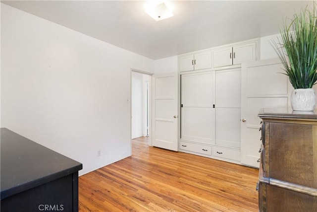 7933 Rhea Vista Dr, Whittier, CA 90602 - unfurnished bedroom featuring light wood-style floors