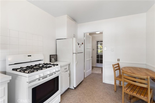 7933 Rhea Vista Dr, Whittier, CA 90602 - kitchen featuring white appliances, light countertops, white cabinets, and light colored carpet