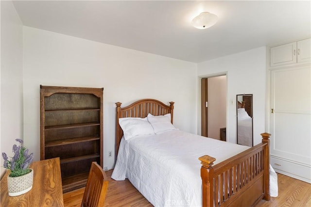 7933 Rhea Vista Dr, Whittier, CA 90602 - bedroom with light wood-style flooring