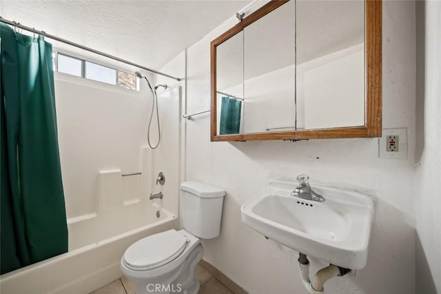 639 S 7th St, Grover Beach, CA 93433 - bathroom featuring shower / bath combination with curtain, toilet, a sink, and tile patterned floors