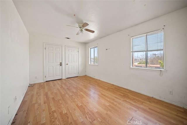 639 S 7th St, Grover Beach, CA 93433 - unfurnished bedroom featuring light wood-style flooring, a ceiling fan, and baseboards