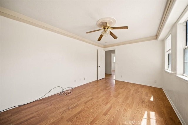 639 S 7th St, Grover Beach, CA 93433 - empty room featuring a ceiling fan, light wood-style floors, baseboards, and ornamental molding