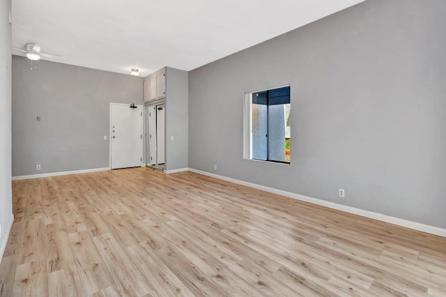 8328 Regents Rd Unit 1D, San Diego, CA 92122 - unfurnished room with light wood-type flooring, baseboards, and ceiling fan