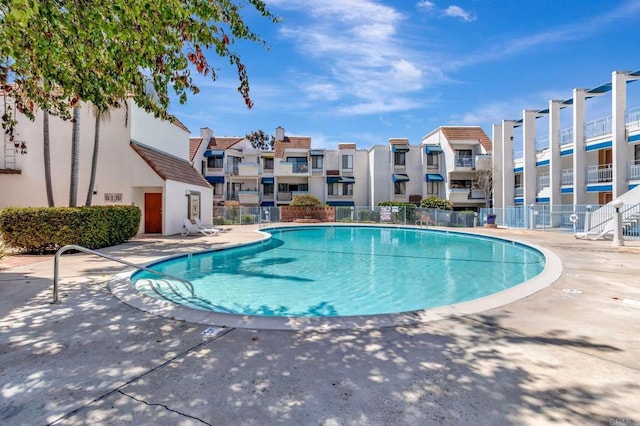 8328 Regents Rd Unit 1D, San Diego, CA 92122 - community pool with a residential view and a patio area