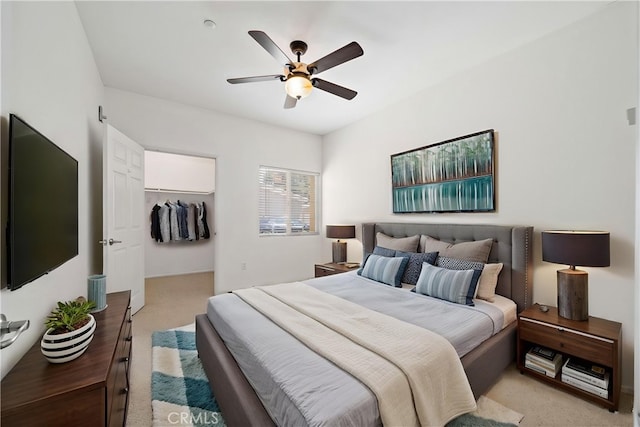 41410 Juniper St Unit 712, Murrieta, CA 92562 - bedroom featuring light colored carpet, a ceiling fan, and a spacious closet