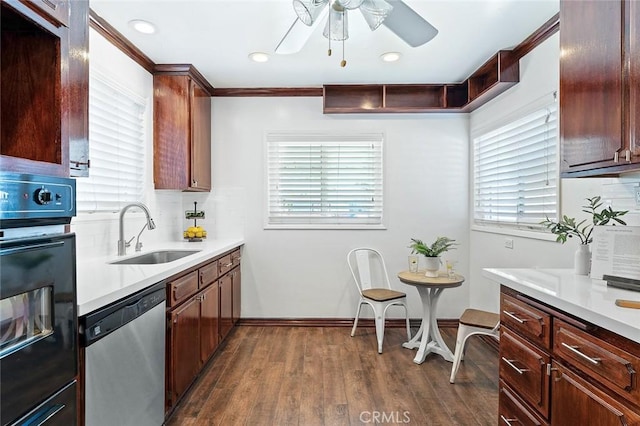 16432 Mcrae Ave, Norwalk, CA 90650 - kitchen with dishwasher, a sink, black oven, ceiling fan, and dark wood-type flooring