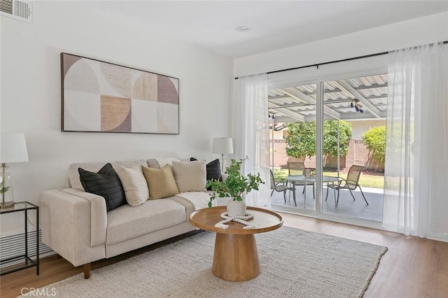 16432 Mcrae Ave, Norwalk, CA 90650 - living room with wood finished floors