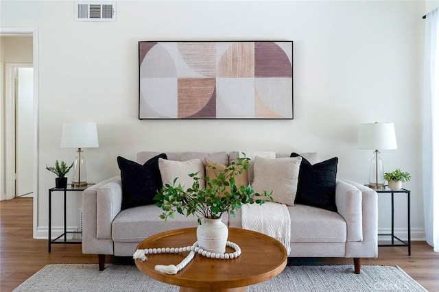 16432 Mcrae Ave, Norwalk, CA 90650 - living area featuring wood finished floors and baseboards