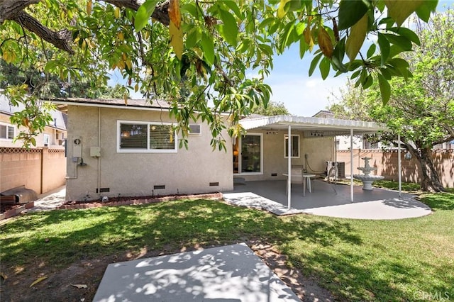 16432 Mcrae Ave, Norwalk, CA 90650 - back of property with crawl space, a patio area, and stucco siding