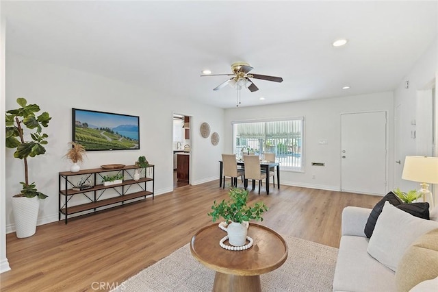 16432 Mcrae Ave, Norwalk, CA 90650 - living area featuring a ceiling fan, light wood finished floors, recessed lighting, and baseboards