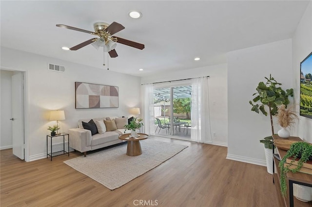 16432 Mcrae Ave, Norwalk, CA 90650 - living room with light wood-style flooring, baseboards, recessed lighting, and a ceiling fan