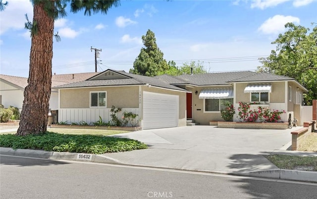 16432 Mcrae Ave, Norwalk, CA 90650 - single story home with driveway, an attached garage, and stucco siding