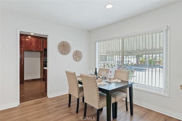 16432 Mcrae Ave, Norwalk, CA 90650 - dining space with baseboards, light wood-style flooring, and recessed lighting