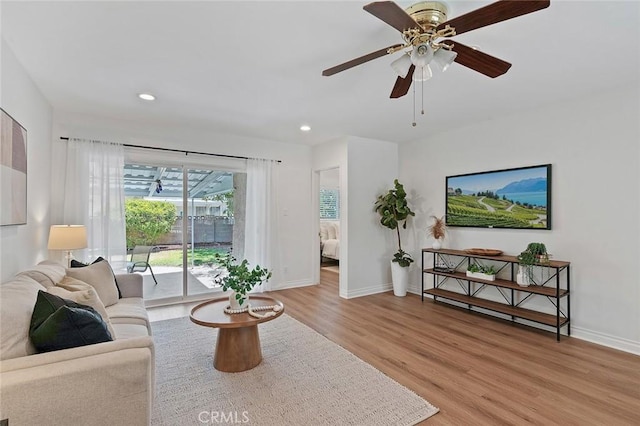 16432 Mcrae Ave, Norwalk, CA 90650 - living area with light wood-type flooring, baseboards, a ceiling fan, and recessed lighting