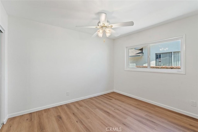 16432 Mcrae Ave, Norwalk, CA 90650 - unfurnished room with light wood-style flooring, baseboards, and a ceiling fan