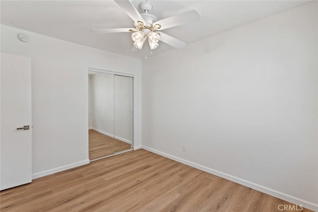 16432 Mcrae Ave, Norwalk, CA 90650 - unfurnished bedroom with wood finished floors, a closet, baseboards, and ceiling fan