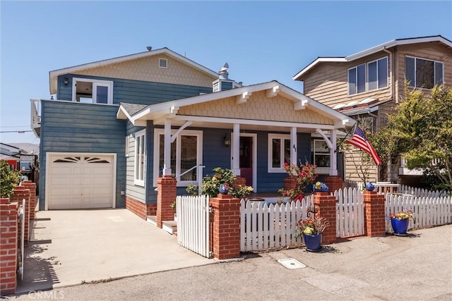 41 19th St, Cayucos, CA 93430 - view of front facade featuring a porch, a fenced front yard, concrete driveway, and a garage
