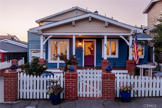 41 19th St, Cayucos, CA 93430 - bungalow featuring covered porch and a fenced front yard