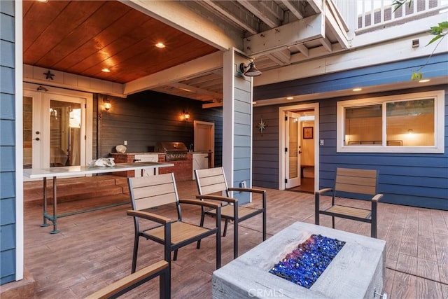 41 19th St, Cayucos, CA 93430 - wooden terrace with an outdoor fire pit