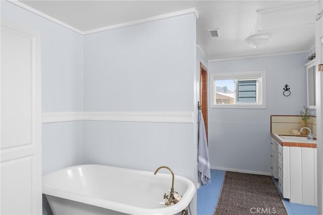 41 19th St, Cayucos, CA 93430 - bathroom featuring a freestanding bath, vanity, and ornamental molding