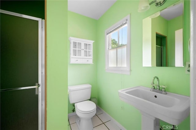 13617 Bassett St, Valley Glen, CA 91405 - bathroom featuring tile patterned flooring and an enclosed shower