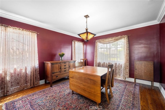 13617 Bassett St, Valley Glen, CA 91405 - dining space featuring wood finished floors and ornamental molding