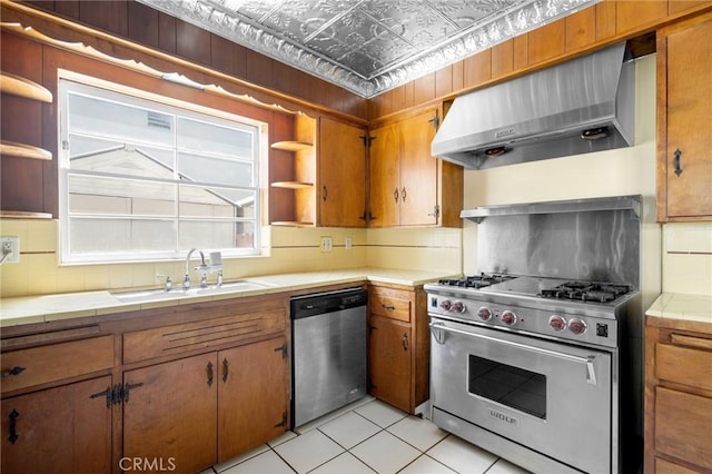 13617 Bassett St, Valley Glen, CA 91405 - kitchen with stainless steel appliances, range hood, open shelves, and tile counters