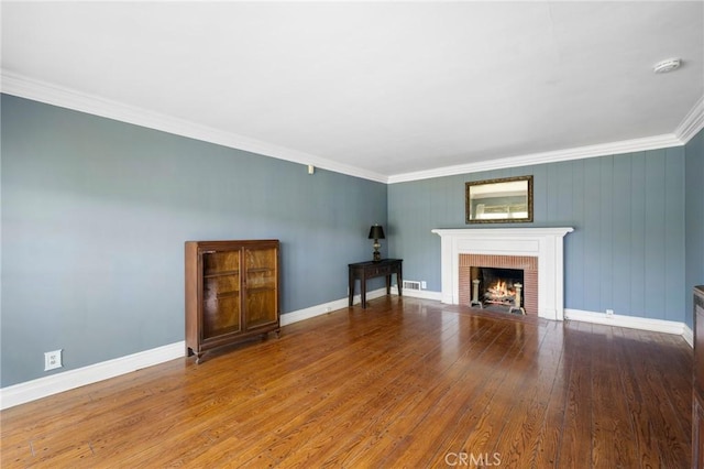 13617 Bassett St, Valley Glen, CA 91405 - unfurnished living room with hardwood / wood-style floors, ornamental molding, and a fireplace