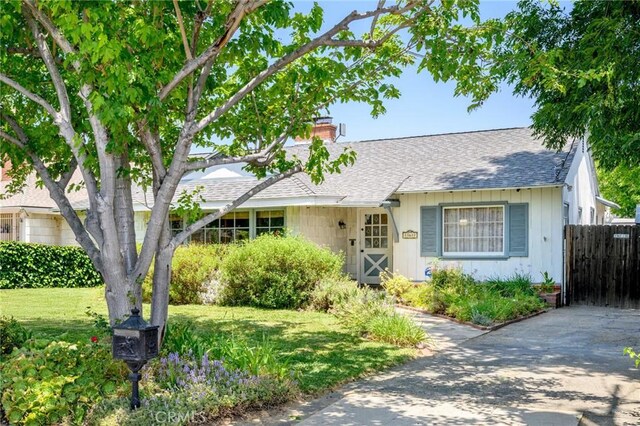 13617 Bassett St, Valley Glen, CA 91405 - view of front of property with a chimney and a shingled roof