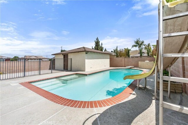 11676 Chesterton St, Norwalk, CA 90650 - view of pool featuring a fenced backyard, a patio, a hot tub, and a diving board