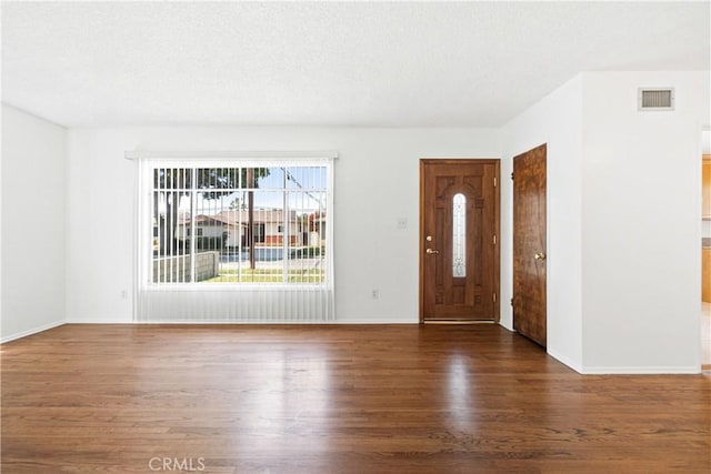 11676 Chesterton St, Norwalk, CA 90650 - foyer with wood finished floors and baseboards