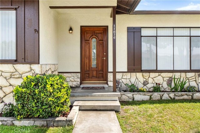 11676 Chesterton St, Norwalk, CA 90650 - view of exterior entry featuring stone siding