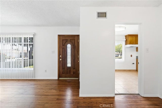 11676 Chesterton St, Norwalk, CA 90650 - foyer featuring wood finished floors and baseboards