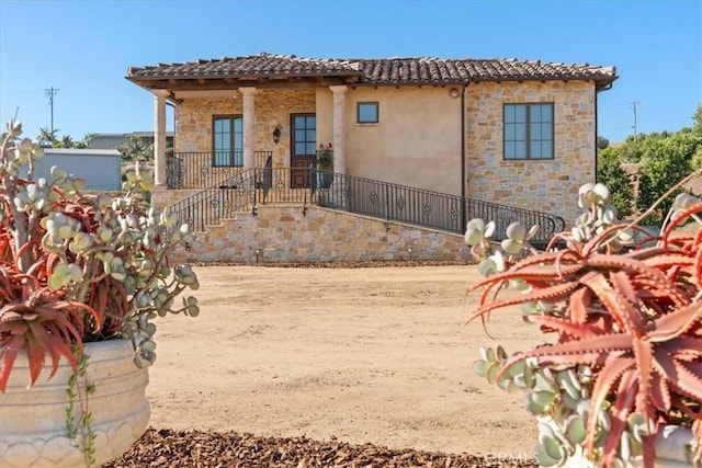1470 Via Chaparral, Fallbrook, CA 92028 - rear view of property with stone siding, a tile roof, and stucco siding