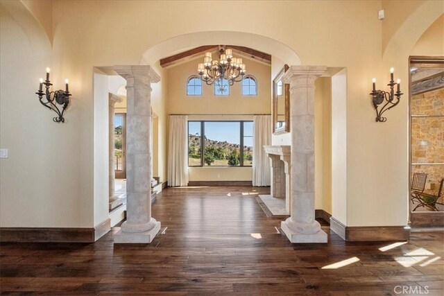 1470 Via Chaparral, Fallbrook, CA 92028 - foyer with dark wood-type flooring, decorative columns, a tile fireplace, high vaulted ceiling, and baseboards