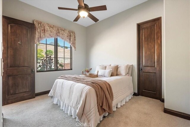 1470 Via Chaparral, Fallbrook, CA 92028 - bedroom with light carpet, baseboards, and a ceiling fan
