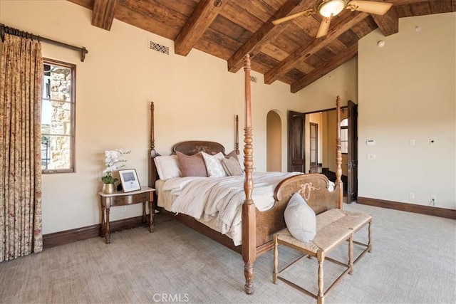 1470 Via Chaparral, Fallbrook, CA 92028 - bedroom with wooden ceiling with exposed beams, carpet floors, arched walkways, baseboards, and high vaulted ceiling