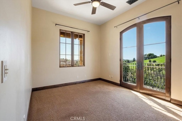 1470 Via Chaparral, Fallbrook, CA 92028 - carpeted empty room with healthy amount of natural light, french doors, ceiling fan, and baseboards