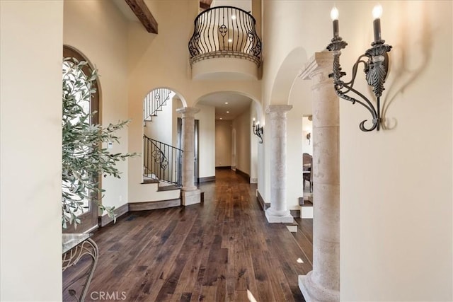 1470 Via Chaparral, Fallbrook, CA 92028 - entrance foyer with decorative columns, arched walkways, wood-type flooring, a towering ceiling, and stairway
