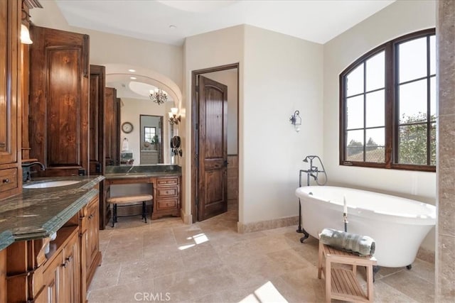 1470 Via Chaparral, Fallbrook, CA 92028 - bathroom with vanity, a soaking tub, a chandelier, and baseboards