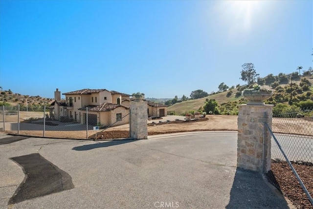 1470 Via Chaparral, Fallbrook, CA 92028 - view of asphalt driveway featuring a gated entry