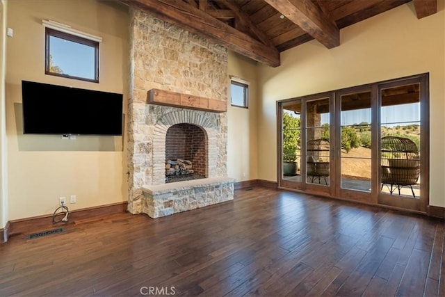 1470 Via Chaparral, Fallbrook, CA 92028 - unfurnished living room with wood ceiling with exposed beams, hardwood / wood-style flooring, a stone fireplace, baseboards, and high vaulted ceiling
