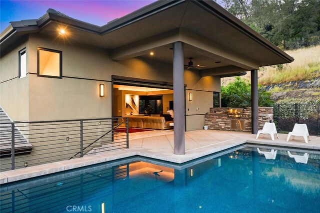 3386 Canyon Oaks Ter, Chico, CA 95928 - outdoor pool featuring exterior kitchen, a patio area, and a ceiling fan