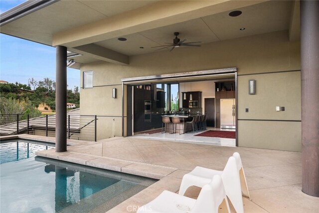 3386 Canyon Oaks Ter, Chico, CA 95928 - view of swimming pool featuring a patio and ceiling fan