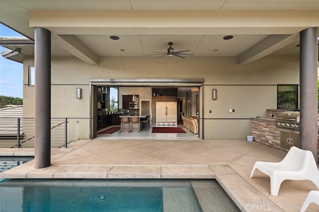 3386 Canyon Oaks Ter, Chico, CA 95928 - rear view of property with an outdoor kitchen, an outdoor pool, a ceiling fan, stucco siding, and a patio area